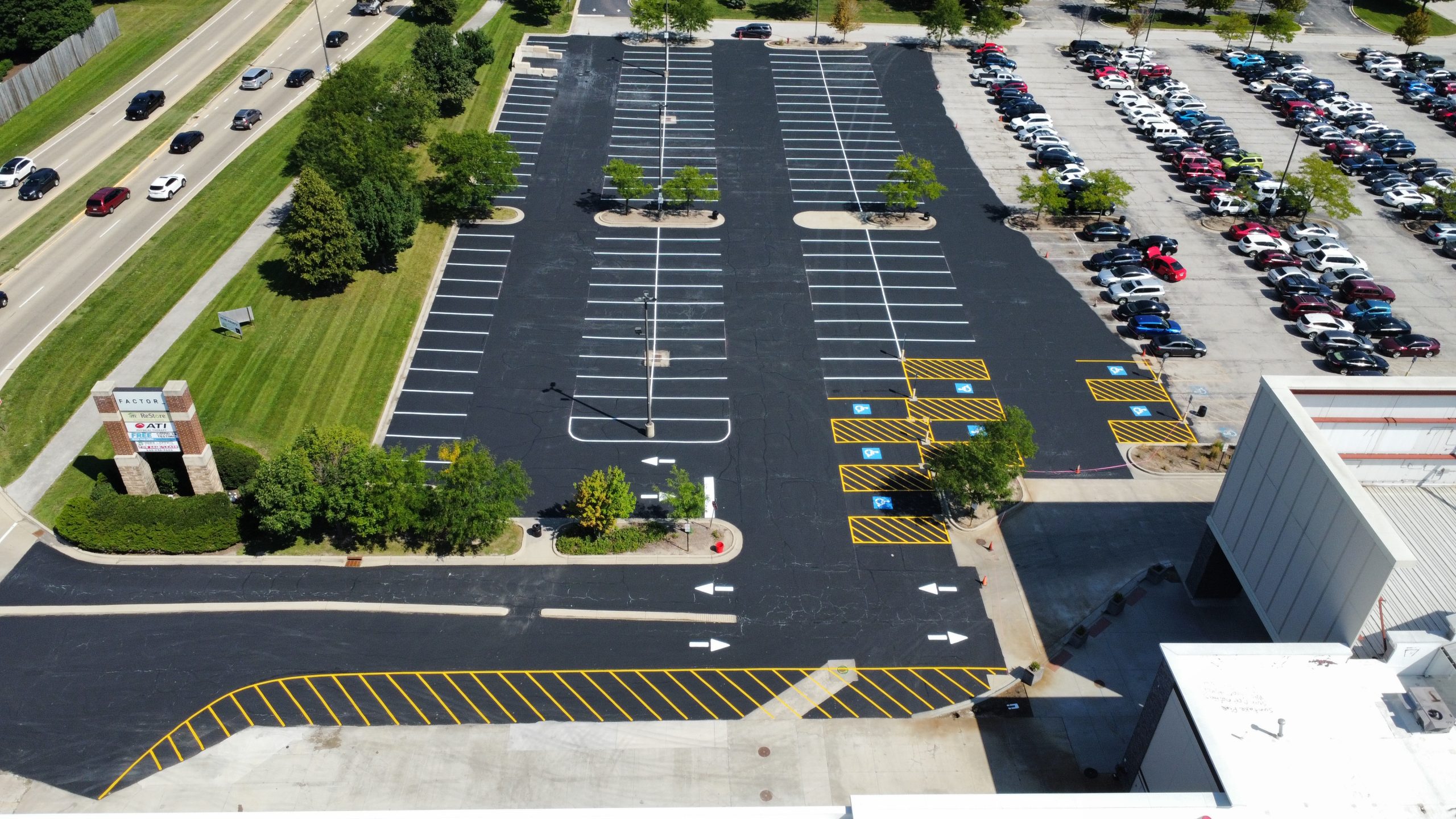 Parking lot sealcoating, crack sealing, and striping services in Aurora Missouri for smooth, protected, and freshly maintained asphalt surfaces
