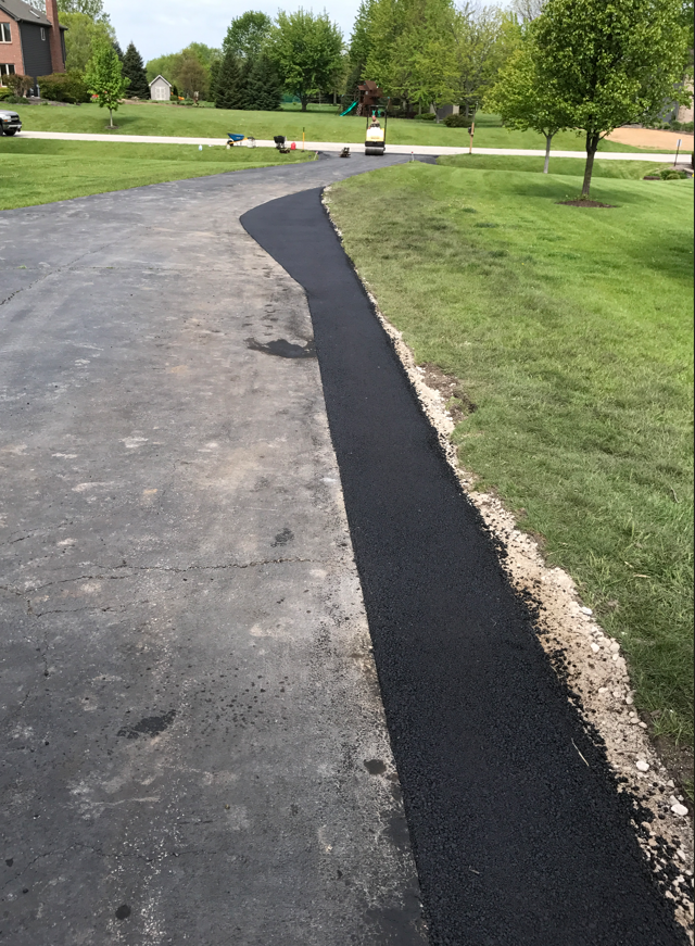 Asphalt driveway extension service by 417 Striping & Sealing in Missouri