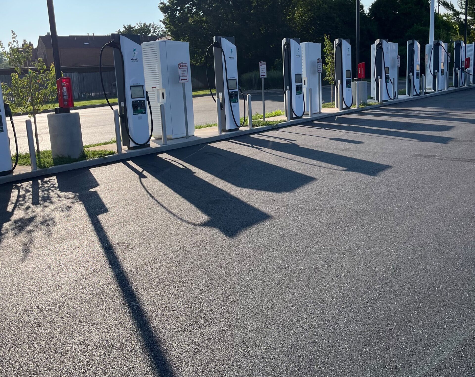 Commercial parking lot line striping for EV charging stations by 417 Striping in Springfield
